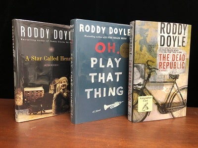 Item #10898 The Roundup Trilogy: A Star Called Henry, Oh, Play That Thing and The Dead Republic. Roddy Doyle.
